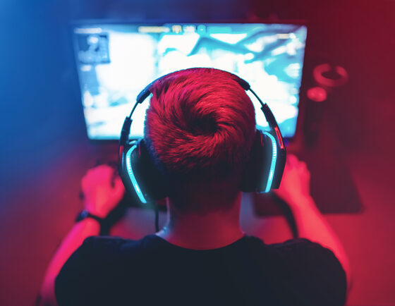 Background,Professional,Gamer,Playing,Tournaments,Online,Games,Computer,With,Headphones, title
