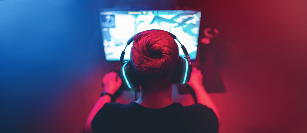 Background,Professional,Gamer,Playing,Tournaments,Online,Games,Computer,With,Headphones, title